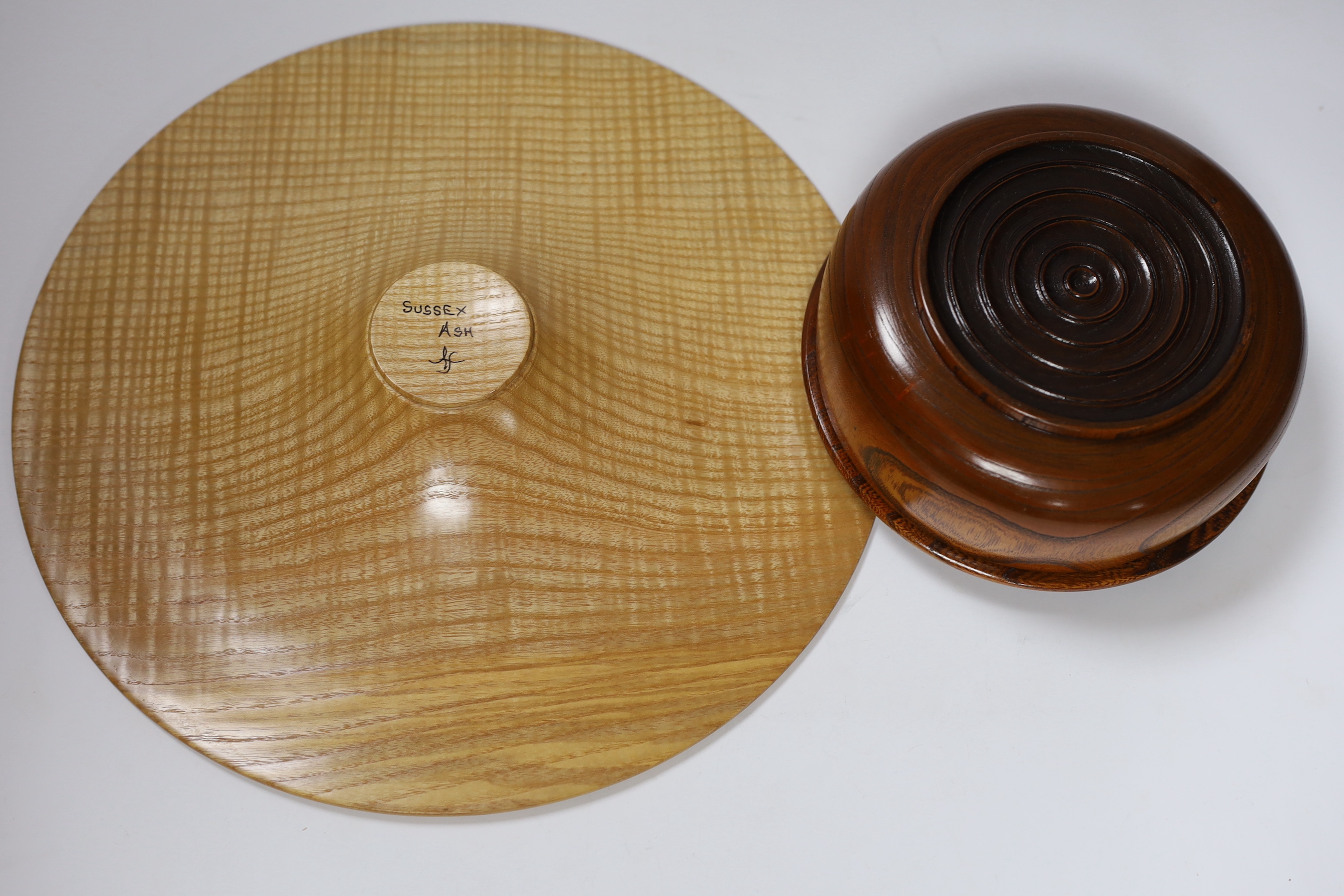 A contemporary Sussex Ash bowl, together with an elm bowl and cover, largest 32cm diameter